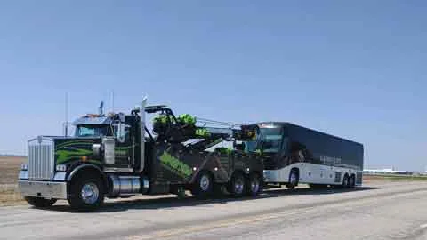 Bus towing near Yoder, KS